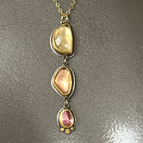 “Sunset Streak” pink Sapphire necklace by Ananda Khalsa. New in box.